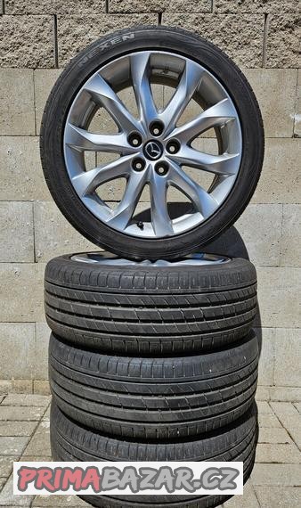 Mazda ALU 18 pneu 215/45 R18  letní 6mm 4X