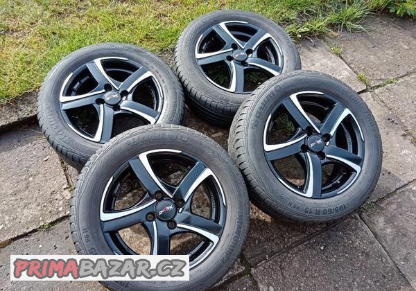 Obutá Alu kola 15ky 4x108 pneu 85% FORD - dobírka možná