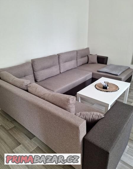 Velká rozkládací sedací souprava do U