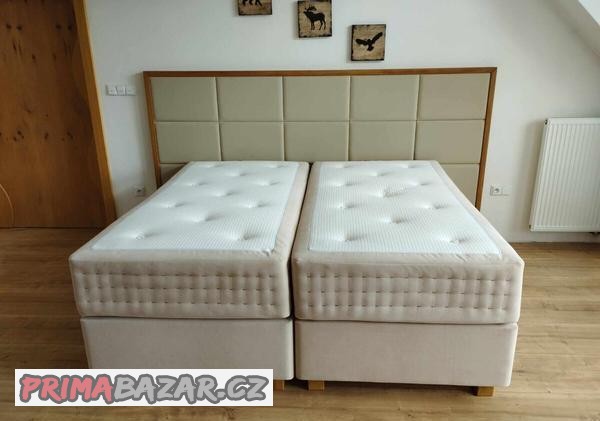 masivni-calounena-postel-vcetne-matraci-a-topperu