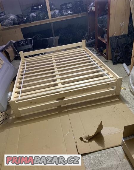 drevena-postel-180x200-borovice-manzelska-s-rostem