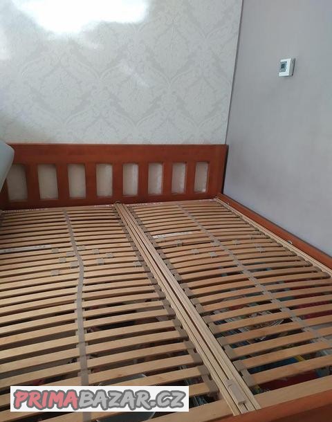 Postel + polohovatené rošty + matrace zdarma ,rozměr 180200