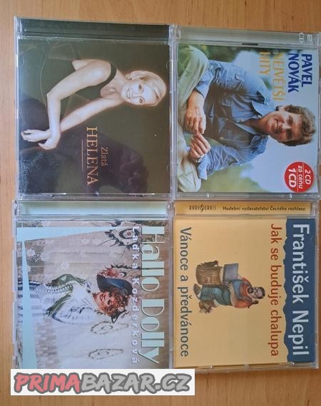 Čtyři kusy různorodých CD