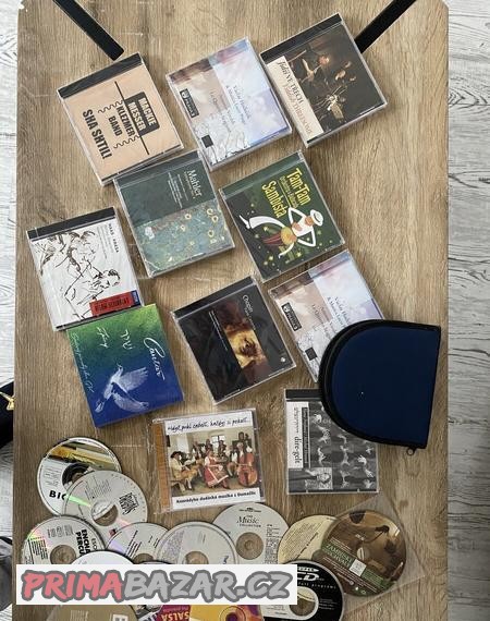 MIX různých CD + futrál