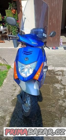 honda-scv100-lead