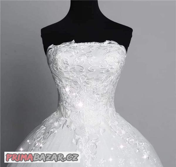 nove-trpytive-svatebni-saty-bride